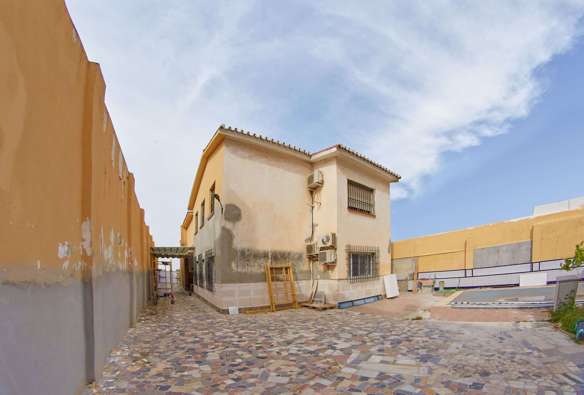 Pintado de fachada chalet Alhaurin de la Torre